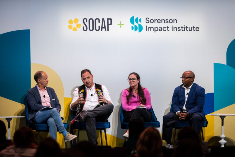 photo of panel on stage at SOCAP23